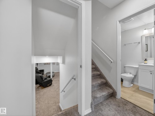 Staircase with carpet flooring - 4603 32 Avenue, Edmonton, AB - Indoor Photo Showing Other Room