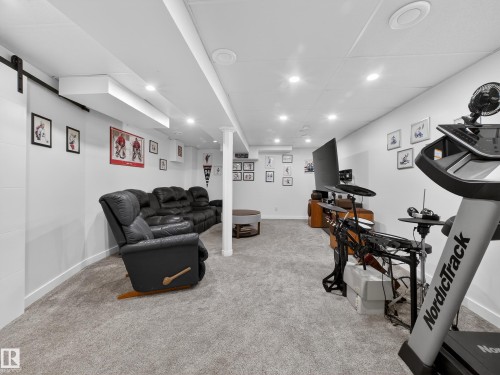Workout room with light colored carpet and recessed lighting - 4603 32 Avenue, Edmonton, AB - Indoor