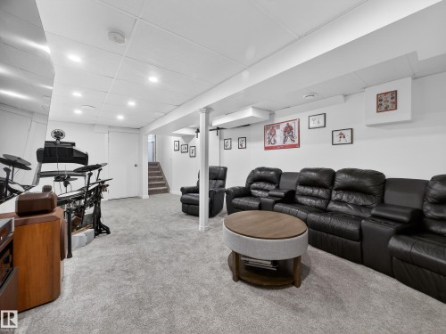 Living room with light carpet and recessed lighting - 4603 32 Avenue, Edmonton, AB - Indoor