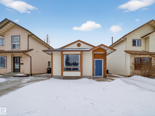 View of front of house featuring board and batten siding - 4603 32 Avenue, Edmonton, AB - Outdoor With Facade