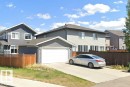 Traditional home with concrete driveway and a garage - 4303 Prowse Link, Edmonton, AB  - Outdoor 