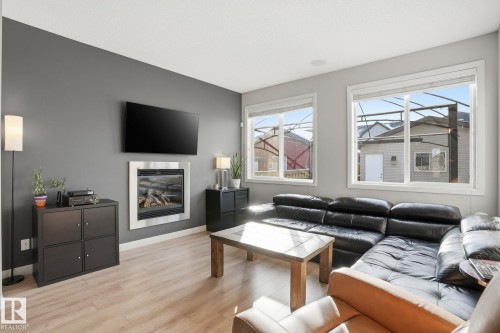 1148 Mcconachie Boulevard, Edmonton, AB - Indoor Photo Showing Living Room With Fireplace