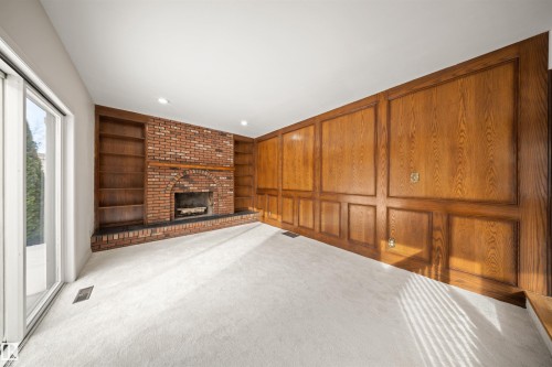 823 Richards Crescent, Edmonton, AB - Indoor Photo Showing Other Room With Fireplace