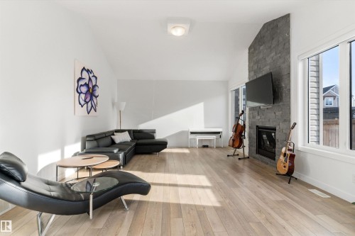 20007 16 Avenue, Edmonton, AB - Indoor Photo Showing Other Room With Fireplace