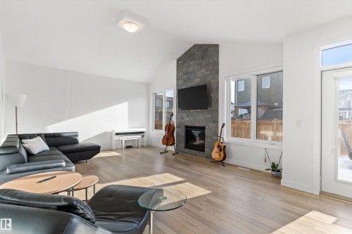 20007 16 Avenue, Edmonton, AB - Indoor Photo Showing Living Room With Fireplace