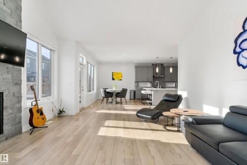20007 16 Avenue, Edmonton, AB - Indoor Photo Showing Living Room With Fireplace
