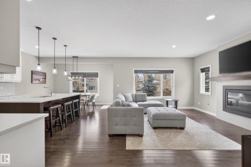 3333 West Court, Edmonton, AB - Indoor Photo Showing Living Room With Fireplace