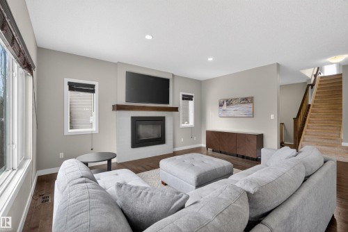 3333 West Court, Edmonton, AB - Indoor Photo Showing Living Room With Fireplace