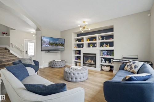 5911 7 Avenue, Edmonton, AB - Indoor Photo Showing Living Room With Fireplace