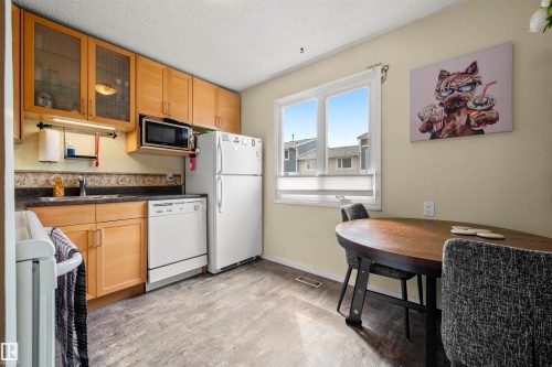 116 Callingwood Two, Edmonton, AB - Indoor Photo Showing Kitchen