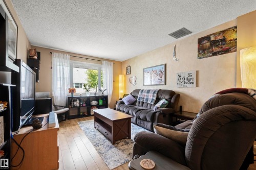 116 Callingwood Two, Edmonton, AB - Indoor Photo Showing Living Room