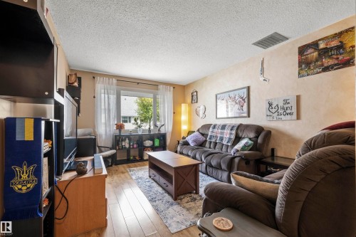 116 Callingwood Two, Edmonton, AB - Indoor Photo Showing Living Room