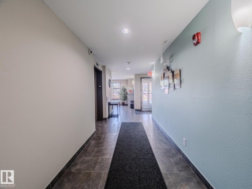 409 6070 Schonsee Way, Edmonton, AB - Indoor Photo Showing Other Room