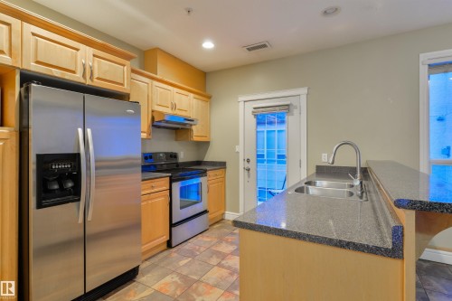 8016 109 Street, Edmonton, AB - Indoor Photo Showing Kitchen With Stainless Steel Kitchen With Double Sink