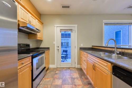 8016 109 Street, Edmonton, AB - Indoor Photo Showing Kitchen With Stainless Steel Kitchen With Double Sink
