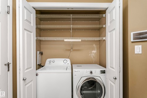 Laundry area with independent washer and dryer - 607 Windross Crescent, Edmonton, AB - Indoor Photo Showing Laundry Room