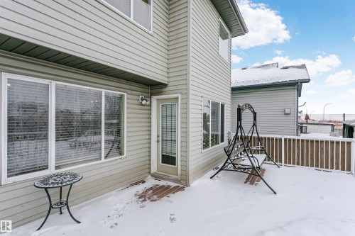 Snow covered patio with a deck - 607 Windross Crescent, Edmonton, AB - Outdoor With Deck Patio Veranda
