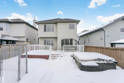 Back of house with a deck and a gate - 607 Windross Crescent, Edmonton, AB - Outdoor With Deck Patio Veranda With Exterior