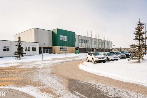 Snow covered property with uncovered parking - 607 Windross Crescent, Edmonton, AB - Outdoor