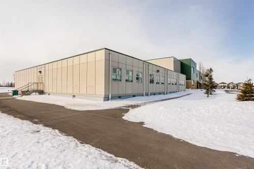 View of snow covered building - 607 Windross Crescent, Edmonton, AB - Outdoor