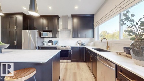 5805 Raven Crescent, Edmonton, AB - Indoor Photo Showing Kitchen With Double Sink With Upgraded Kitchen