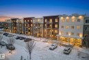 Snow covered property with a view of apartment building / complex - 206 812 Welsh Drive, Edmonton, AB  - Outdoor With Balcony 