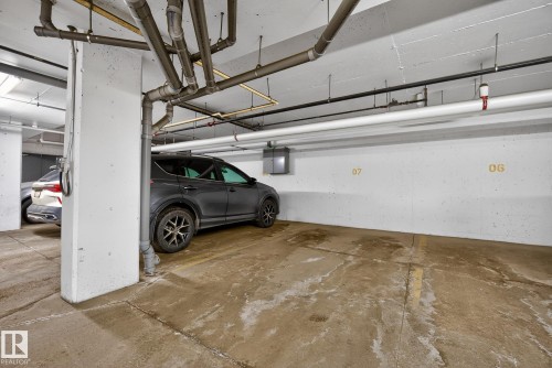 Garage with a parking garage - 206 812 Welsh Drive, Edmonton, AB - Indoor Photo Showing Garage