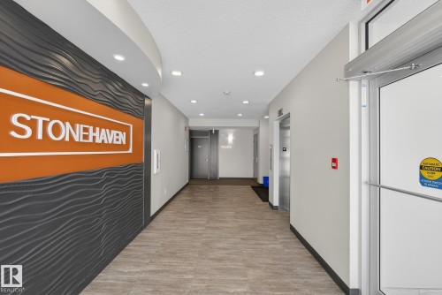 Hall with recessed lighting and elevator - 206 812 Welsh Drive, Edmonton, AB - Indoor Photo Showing Other Room