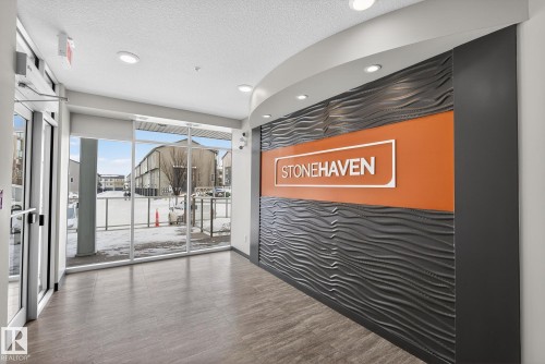 Reception featuring recessed lighting and a textured ceiling - 206 812 Welsh Drive, Edmonton, AB - Indoor