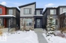 Modern home featuring stone siding - 8018 Kiriak Link, Edmonton, AB  - Outdoor With Balcony With Facade 