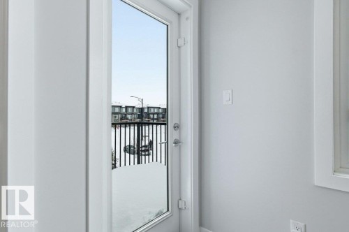 Balcony off of Primary Bedroom facing South - 8018 Kiriak Link, Edmonton, AB - Indoor Photo Showing Other Room