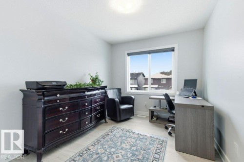 Bedroom area with light wood-type flooring - 8018 Kiriak Link, Edmonton, AB - Indoor Photo Showing Office
