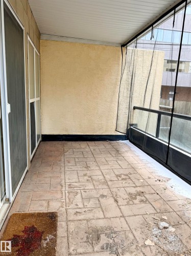 View of unfurnished sunroom - 115 11039 83 Avenue, Edmonton, AB - Outdoor With Exterior