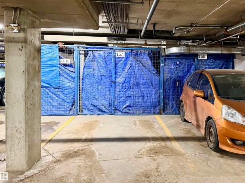 Basement view of unfinished concrete flooring - 115 11039 83 Avenue, Edmonton, AB - Indoor Photo Showing Garage
