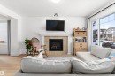 419 Songhurst Place, Leduc, AB  - Indoor Photo Showing Living Room With Fireplace 