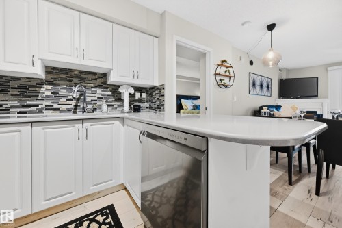 703 10649 Saskatchewan Drive, Edmonton, AB - Indoor Photo Showing Kitchen With Upgraded Kitchen