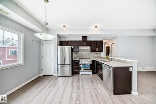 47 460 Hemingway Road, Edmonton, AB - Indoor Photo Showing Kitchen With Stainless Steel Kitchen With Double Sink