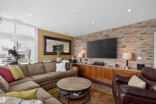 405 1350 Windermere Way, Edmonton, AB - Indoor Photo Showing Living Room
