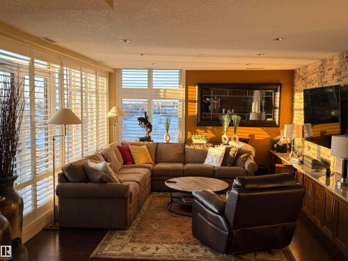405 1350 Windermere Way, Edmonton, AB - Indoor Photo Showing Living Room