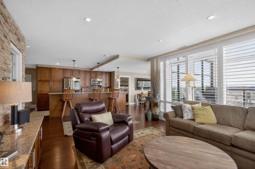 405 1350 Windermere Way, Edmonton, AB - Indoor Photo Showing Living Room