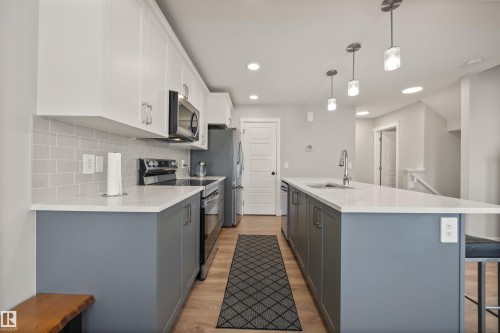 7828 Koruluk Link, Edmonton, AB - Indoor Photo Showing Kitchen With Upgraded Kitchen