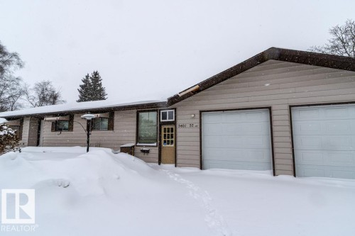 Ranch-style home featuring a garage - 5401 57St, St. Paul Town, AB - Outdoor With Exterior