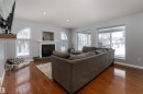 21 Power Drive, Rural Lac Ste. Anne County, AB  - Indoor Photo Showing Living Room With Fireplace 