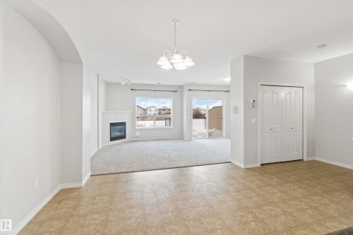 53 3010 33 Avenue, Edmonton, AB - Indoor Photo Showing Other Room With Fireplace