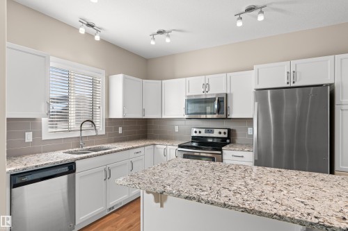 8727 221 Street, Edmonton, AB - Indoor Photo Showing Kitchen With Double Sink With Upgraded Kitchen