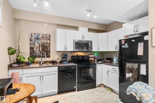 8727 221 Street, Edmonton, AB - Indoor Photo Showing Kitchen With Double Sink
