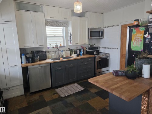 11406 96 Street, Edmonton, AB - Indoor Photo Showing Kitchen With Double Sink