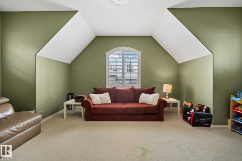 Carpeted living area featuring baseboards - 502 Westerra Boulevard, Stony Plain, AB - Indoor
