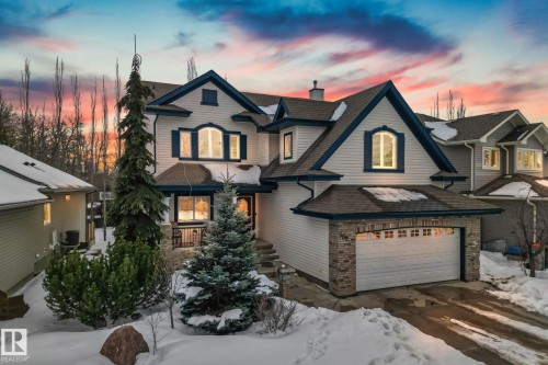 View of front of home with a garage, a chimney, and roof with shingles - 502 Westerra Boulevard, Stony Plain, AB - Outdoor With Facade
