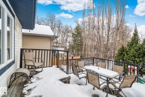 Snow covered deck featuring outdoor dining area - 502 Westerra Boulevard, Stony Plain, AB - Outdoor With Deck Patio Veranda With Exterior